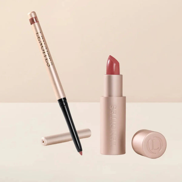 Sculpt and Hydrate Lip Duo by Lenoites featuring a Tinted Lip Balm in color berry, a Shape & Sculpt Lip Liner in color blush, elegantly arranged on a light beige background.