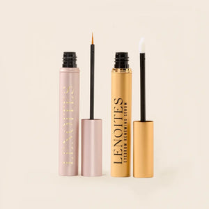 Lash Growth Serum + Eyebrow Growth Serum Set by Lenoites featuring a soft rosegold tube for the lash serum and a gold tube for the eyebrow serum, both with their applicators visible, displayed on a soft beige background.