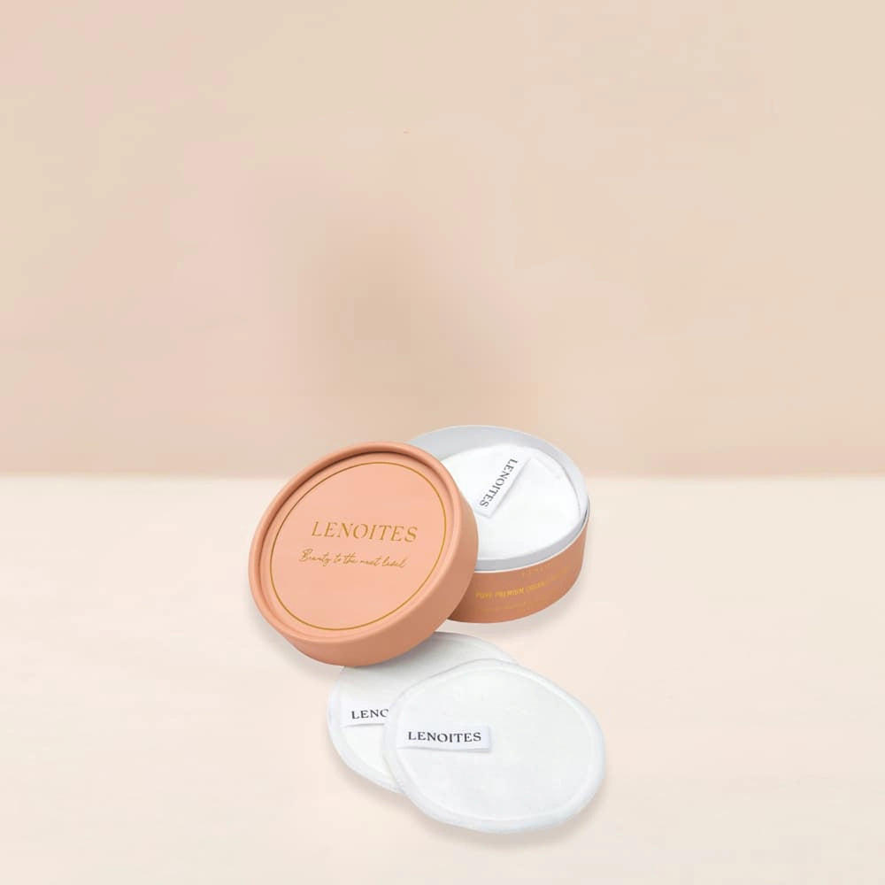 Pure Premium Organic Reusable Rounds Refill by Lenoites, featuring a peach-colored container with the brand logo, displayed against a beige background.